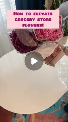 a white table with pink flowers on it and the words how to elevate grocery store flowers