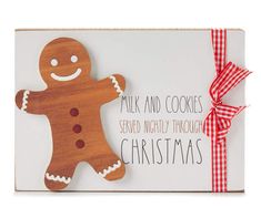 a christmas card with a wooden cutout of a ginger