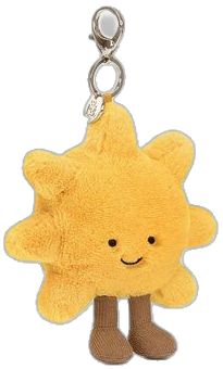 a yellow stuffed animal keychain with a smiley face