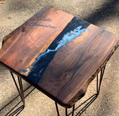 a table made out of wood with writing on it