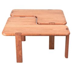 two wooden tables sitting on top of each other in the shape of a rectangle table