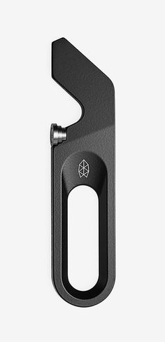 an open black bottle opener on a white background with the letter s in it's center