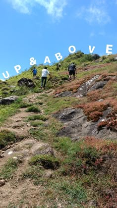 people walking up and down a hill with the word above them that says cup & above