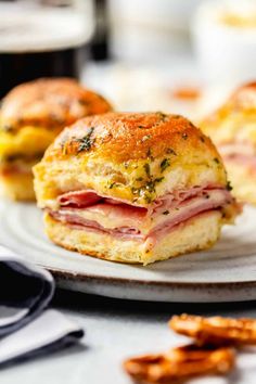 a ham and cheese biscuit on a plate