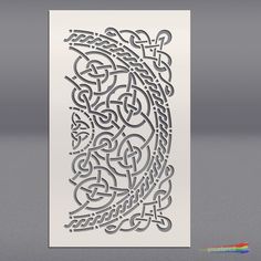 a paper cut design with an intricate pattern in the middle and two different designs on each side