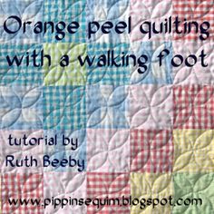 an orange peel quilt with a white and blue checkered pattern