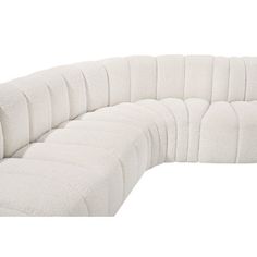 Give your living room or den the perfect blend of style and versatility with this fabric curved modular sofa. Part of the modular furniture collection, this sofa comes upholstered in rich fabric and features deep channel tufting that adds a touch of luxury while enhancing comfort and support. A seamless combination of form and function, this chair can be used with other pieces to create a myriad of configurations in your well-curated room. Fabric: Cream Boucle | Multi Color Sectional - Wrought S Cream Sectional, Sofa Chaise, Meridian Furniture, Boucle Fabric, Modular Furniture, Rich Fabric, Living Room Sectional, Chaise Sofa, Upholstered Sofa