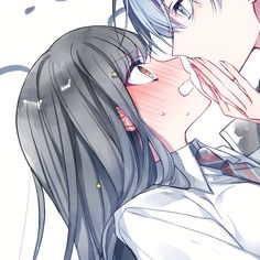 an anime couple kissing each other with their eyes closed