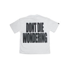 a white t - shirt with the words don't die wondering printed on it