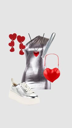 a woman's silver outfit with red heart decorations on the top and white shoes