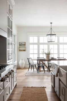 the kitchen is clean and ready to be used for dining or living room purposess