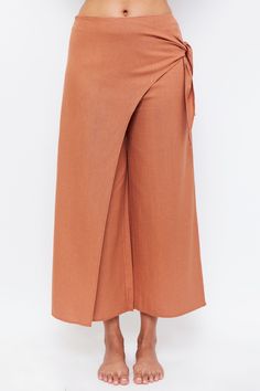 Exude vacation vibes. The pair of trousers that combines premium, style, and modesty. So you never compromise on form or function on your next getaway. The culotte-style trousers you dream of while in the heat, provide complete coverage and flattering waist detailing to keep you cool and covered. Wrap yourself in the mix semi-skirt wrap for a distinctive take on a classic cut. 100% premium cotton for durability and cool Flattering side-waist belt design Subtle side pockets for your grab and go h Cute Modest Swimwear, Beach Trousers, Hijab Collection, Beachwear Collection, Modest Swimsuits, Vacation Vibes, Modest Swimwear, Belt Design, You Dream