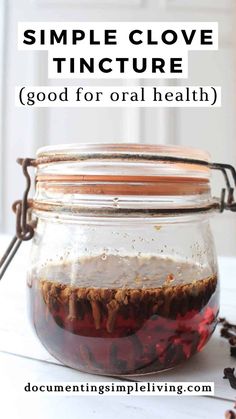 A glass jar with cloves in alcohol to make a clove tincture. There are dried cloves next to the glass jar. Clove Tincture, Herbal Benefits, Tinctures Recipes, Natural Medicine Cabinet, Medicinal Herbs Garden