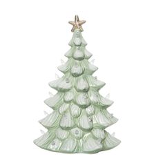 a green glass christmas tree with lights on it's sides and a star hanging from the top