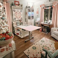 a living room filled with furniture and a christmas tree