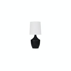 a black table lamp with a white shade