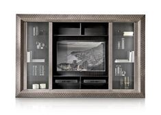 an entertainment center with glass doors and shelves