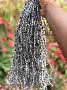 About this item- Quantity: 10 Locs/bundle- Available Colors: Salt & Pepper - Length: 4”-20” (Inches)- Size: 0.3-0.35cm- Style: Textured Interlocked- Material: Afro Kinky Human Hair Textured Intalocs made with Afro Kinky Human Hair dreadlocks extensions to your desired dimensions. These locs are strong, realistic looking and affordable. Natural Gray Hair Over 50 Black Women, Grey Hair Locs, Interlocked Locs, Grey Locs, Grey Hair Braids, Locs Extensions, Small Dreads, Hair Dreadlocks, Sister Locks