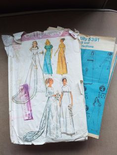 two pieces of paper that have been cut out to look like dresses and gowns