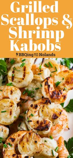 grilled scallops and shrimp kabobs on a plate with parsley