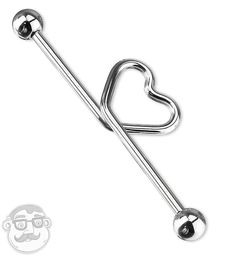 a heart shaped metal barbell with a ball on the end and an eyeball in the middle