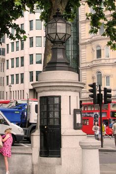 This Trafalgar Square sight is routinely ignored by the masses—a stone structure in the southeast corner was once the world’s smallest police station. Equipped with a telephone (connected to a main police station) and just enough space to swing a truncheon, it had room for one officer to watch over marches, demonstrations and riots in the square. Today, it’s used to house cleaning supplies. House Cleaning Supplies, Trafalgar Square London, Worlds Smallest, London Police, Victorian London, Trafalgar Square, Blog Ideas, Police Station