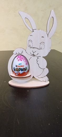 a paper cut out of an easter bunny with the word kindo surprise written on it