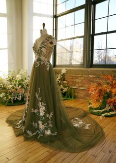 a dress on display in front of a window