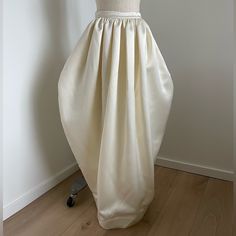 New One Of A Kind - Loveshackfancy Sample Size Small Hidden Pockets On The Side Hidden Zipper On The Side Please See Photo With Sample Information Elegant Cream Maxi Skirt With Ruffles, Elegant Cream Ruffled Maxi Skirt, White Silk Full Skirt, Elegant Cream Gathered Skirt, Silk Voluminous Skirt For Wedding, Silk Wedding Skirt With Voluminous Fit, Silk Voluminous Wedding Skirt, Voluminous Silk Wedding Skirt, Elegant Wedding Gathered Skirt