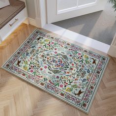 a rug on the floor in front of a door