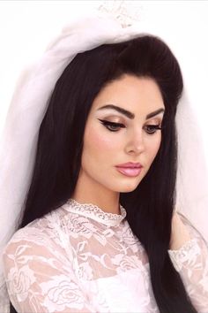 Jackie Wyers dressed as Priscilla Presley for her wedding to Elvis Presley in the 60s. Jackie made a veil, tiara, and replicated the bronze eye makeup and pink lip. Linked is a full tutorial Priscilla Presley Makeup Wedding, Wedding Makeup 60s, Priscilla Presley Make Up Looks, 60s Teased Hair, 60s Inspired Bridal Makeup, Retro Makeup 60s, 60s Makeup Bridal, 70s Bride Makeup, Sixties Wedding Hair