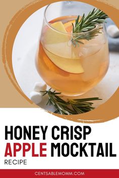 the recipe for honey crisp apple cocktail is in a glass with rosemary garnish