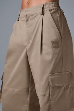 Landing the perfect pair of statement pants can be tricky, which is why we made the Night Out Cargo Trousers. Done in crisp yet soft cotton twill, they have front pleats for a touch of volume, oversized cargo pockets, and dramatic, baggy legs. And zoom in on the waistband—it’s tailored in front and stretchy in back for a comfortable, custom-to-you fit. Seal the deal with the coordinating Night Out Cargo Jacket. Womens Onesie, Statement Pants, Gray Accessories, Cargo Jacket, Womens Capris, Cargo Trousers, Short Shirts, Crop Tops Women, Bra Tops