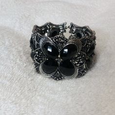 Pretty Metal Cuff Bracelet With Butterfly Design Measures 1 1/2" Wide At The Widest Part. Very Sparkly And Elegant To Go With A Variety Of Outfits. Nickel-free Black Bracelets For Party, Nickel-free Black Bracelet For Party, Silver Stretch Bangle Bracelet For Party, Party Black Nickel-free Bracelets, Adjustable Black Nickel-free Cuff Bracelet, Vintage Black Nickel-free Bracelets, Formal Silver Metal Stretch Bracelet, Black Metal Cuff Bracelet As Gift, Nickel Free Black Bangle Jewelry