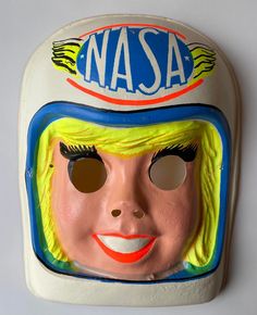 "Welcome to Bobby's vintage Fun & Dime! For your consideration is a rare, vintage NASA girl astronaut Halloween child-sized costume mask by Ben Cooper in the 1970s. This is in fantastic, unused condition. Please be advised that this is not a \"perfect\" mask. It's in wonderful, unused condition, but few things are ever truly mint. You get the mask pictured in the listing. This sources from an enormous collection of vintage Halloween masks and other items that source from a warehouse find of simi Vintage Masks For Halloween Costume Party, Vintage Halloween Costume Masks And Prosthetics, Vintage Halloween Costume Party Masks, Vintage Masks For Costume Party, Vintage Mascara, Vintage Halloween Masks, Astronaut Halloween Costume, Vintage Halloween Mask, Astronaut Halloween