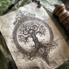 the tree of life is drawn on a piece of paper