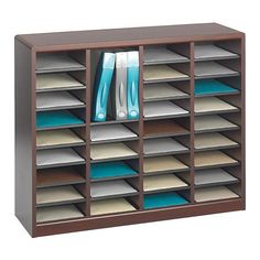 a wooden shelf filled with files and folders