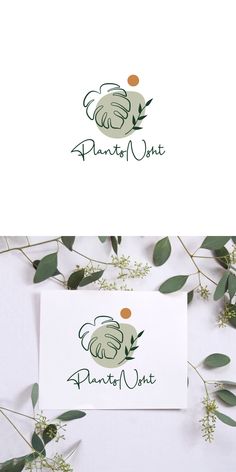 the logo for plants and nuts is shown on top of a white background with green leaves