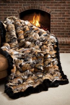 a fire place that has a blanket on it