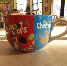 two coffee mugs with the words frito pops and cheetos on them