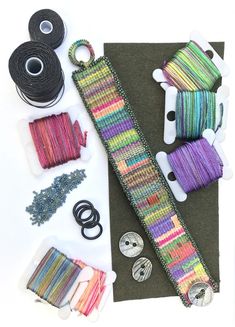 some spools of thread and other crafting supplies