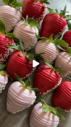 chocolate covered strawberries are arranged on a table