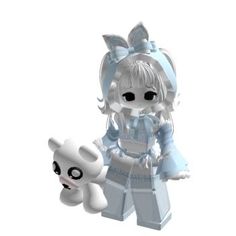 a white and blue doll next to a small toy dog on a white background,