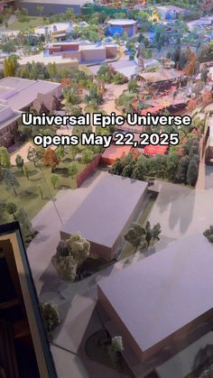 an aerial view of a city with trees and buildings in the foreground text reads universal epic universe opens may 2, 2016