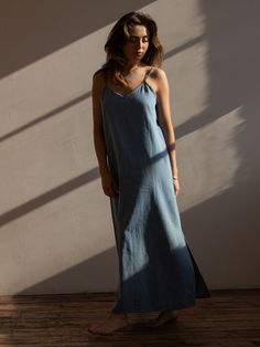 The Denim Cami Dress for women has been designed with a sleek, simple cami style, adjustable straps for a perfect fit and a side seam split that’s both stylish and practical. It looks just dreamy by itself, or layer it to perfection with The Chambray Shirt or The Chunky Sweater.Our small-batch wash process means that each of our denim garments will vary slightly in color and appearance.• Composition: 100% cotton• Available in: LIGHT DENIM• US sizes: XS (US 0–2), S (US 4–6), M (US 8–10), L (US 12 Spring Slip Dress With Spaghetti Straps And Side Slits, Denim Blue Dress With Spaghetti Straps, Everyday V-neck Summer Dresses, Everyday Dresses With Adjustable Straps, Denim Garments, Newborn Sets, Jumpsuit Jacket, Chambray Shirt, Chunky Sweater