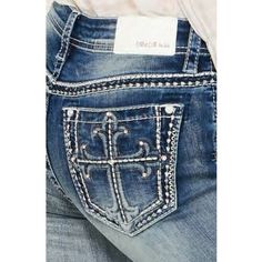 The Grace In La Women's Bootcut Jean In Easy Fit Shows Off Your Best Shape By Featuring A Higher Rise. The Denim Fabric Features A Softer And Higher Stretch For Exceptional Comfort All While Maintaining A Denim Look. The Mid-Rise Creates A Form-Flattering Fit For Every Curve. The Jean Is Detailed In A Fleur De Lis Cross Embroidered Design On The Back Pockets With Crystal Embellishment, Added Embellishment On The Front Pockets, Natural Hand-Sanding, And Whiskering. They Look Like They've Been You Pants With Designs, Latina Clothes, Boot Cut Pants, Cropped Denim Pants, Ripped Pants, Ripped Boyfriend Jeans, Floral Patches, Womens Jeans Bootcut, Diy Clothes Design