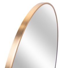 an oval mirror with gold trim around the edges on a white background is shown in this image