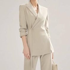 Elevate Your Office Wardrobe with Elegance and Style Introducing the perfect blend of modern chic and vintage elegance - our Vintage Office Lady Suit. This two-piece set features a sophisticated long sleeve blazer paired with high-waist straight pants, creating a polished and professional look ideal for the contemporary woman. Whether you're leading meetings or attending business luncheons, this ensemble ensures you make a statement while embodying confidence and style. Product Features Flattering Fit: Tailored for a slim, flattering fit that accentuates your figure. Versatile Style: Timeless solid pattern, perfect for all-season wear. Comfort and Quality: Made from high-quality polyester broadcloth, offering durability and comfort. Practical Design: Equipped with convenient pockets and a Tailored Suits Women, Elegant Suits For Women, Tailored Suit Women, Power Suits For Women, Suit Set Women, Professional Dress For Women, Lady Suit, Office Wardrobe, Elegant Blazers