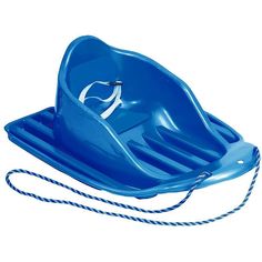 a child's blue plastic sled sitting on top of a white surface with a rope