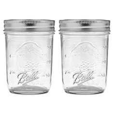 two mason jars with lids are shown side by side